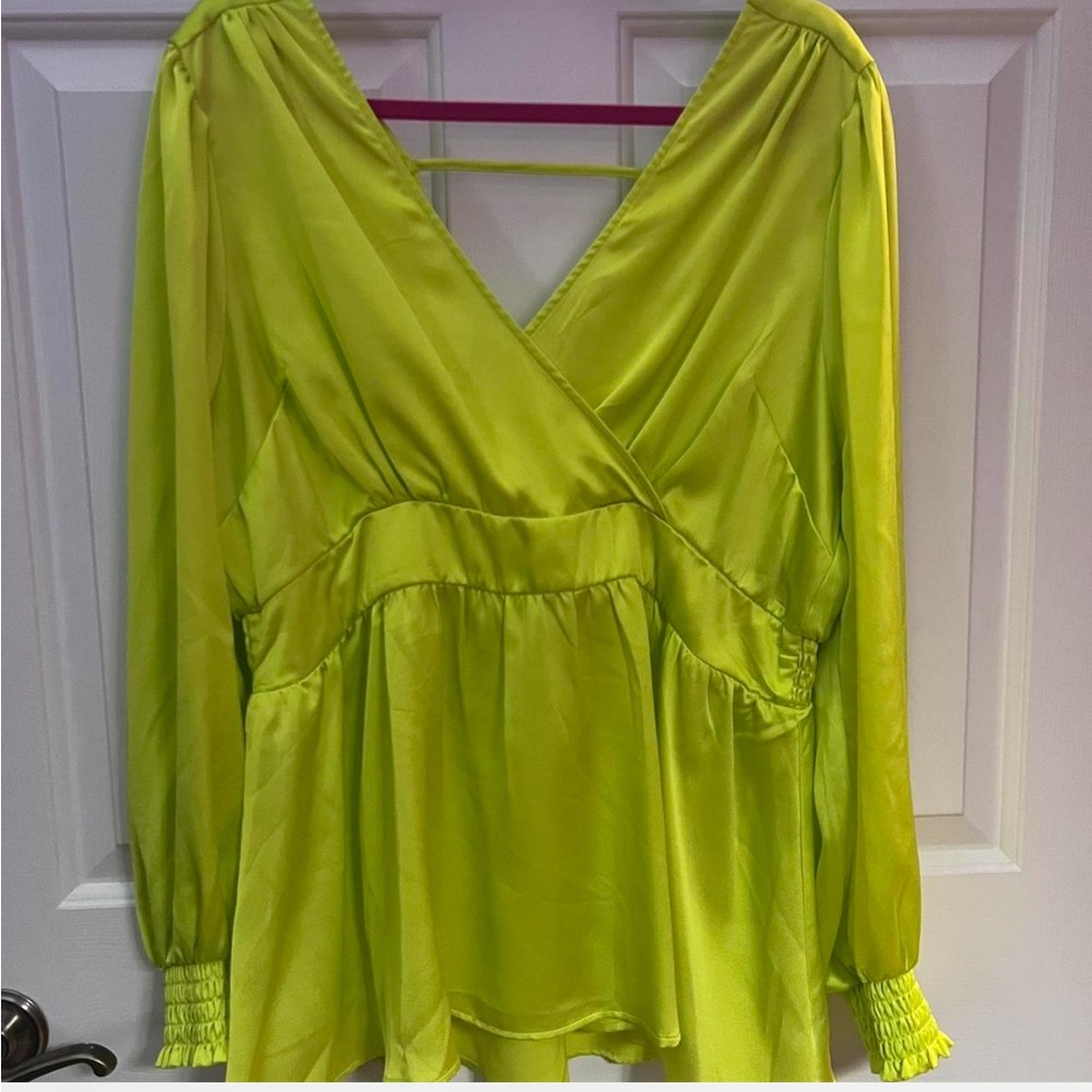 Neon peplum peekaboo back blouse